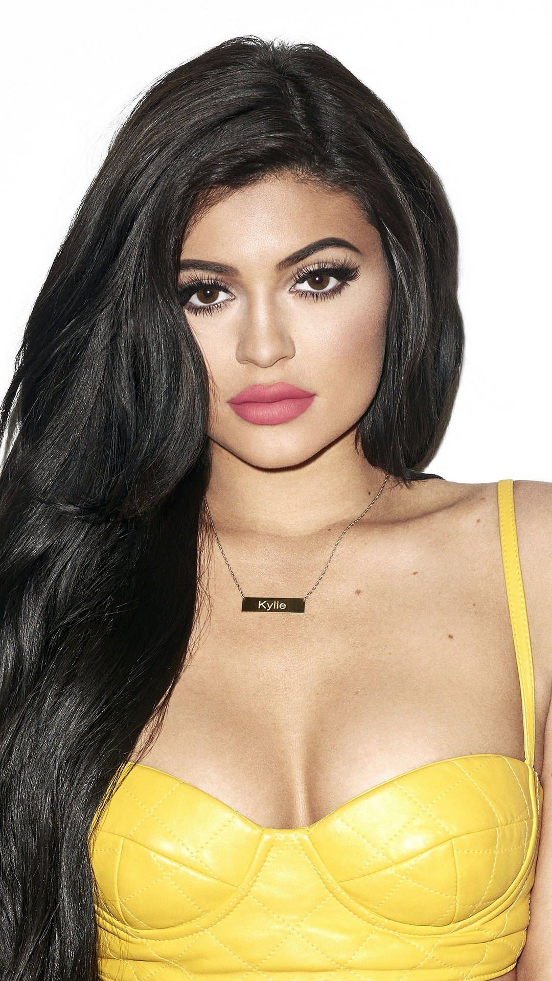 Kylie Jenner In Yellow Brassiere Background