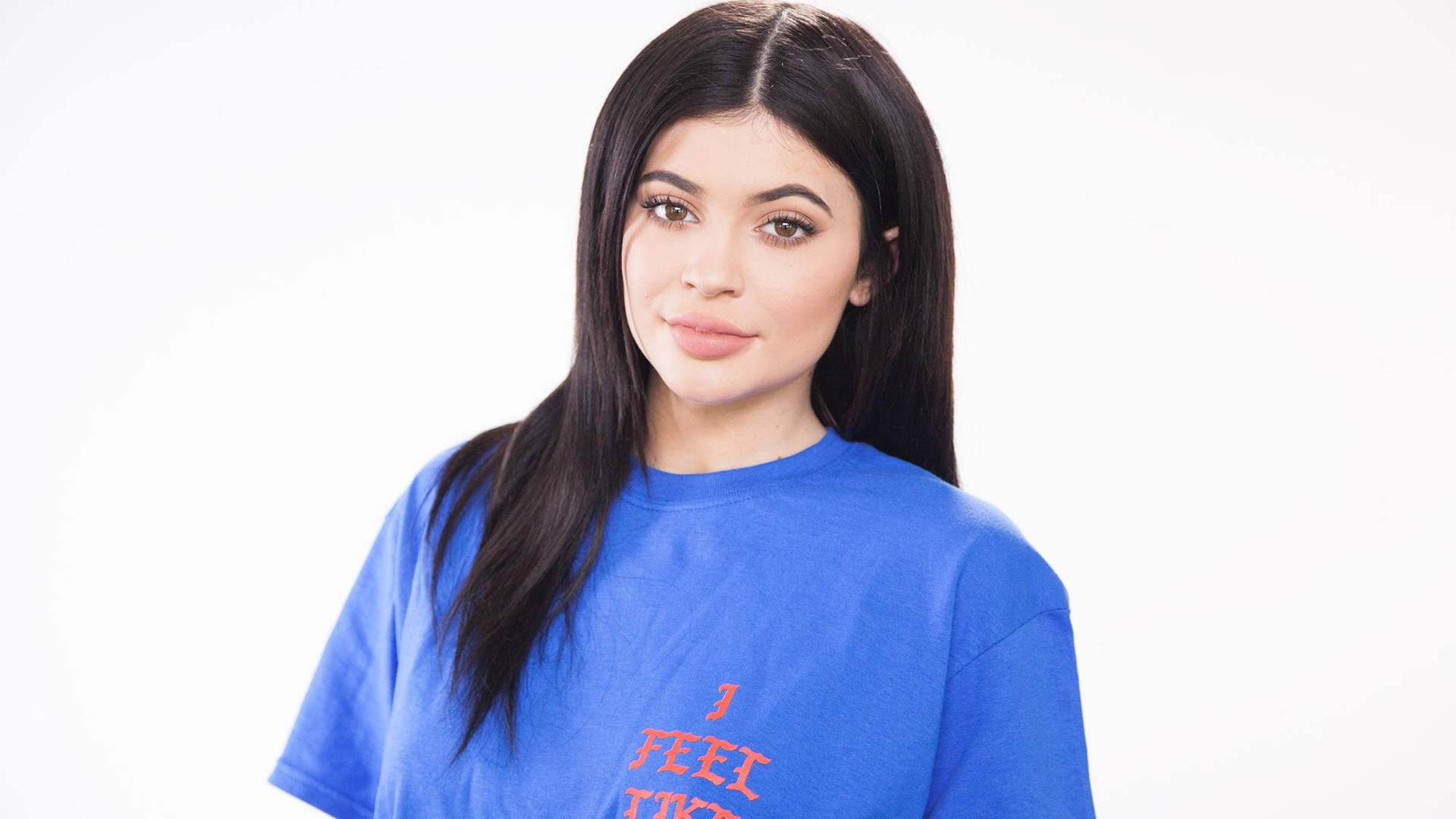 Kylie Jenner Wearing Blue Shirt Background