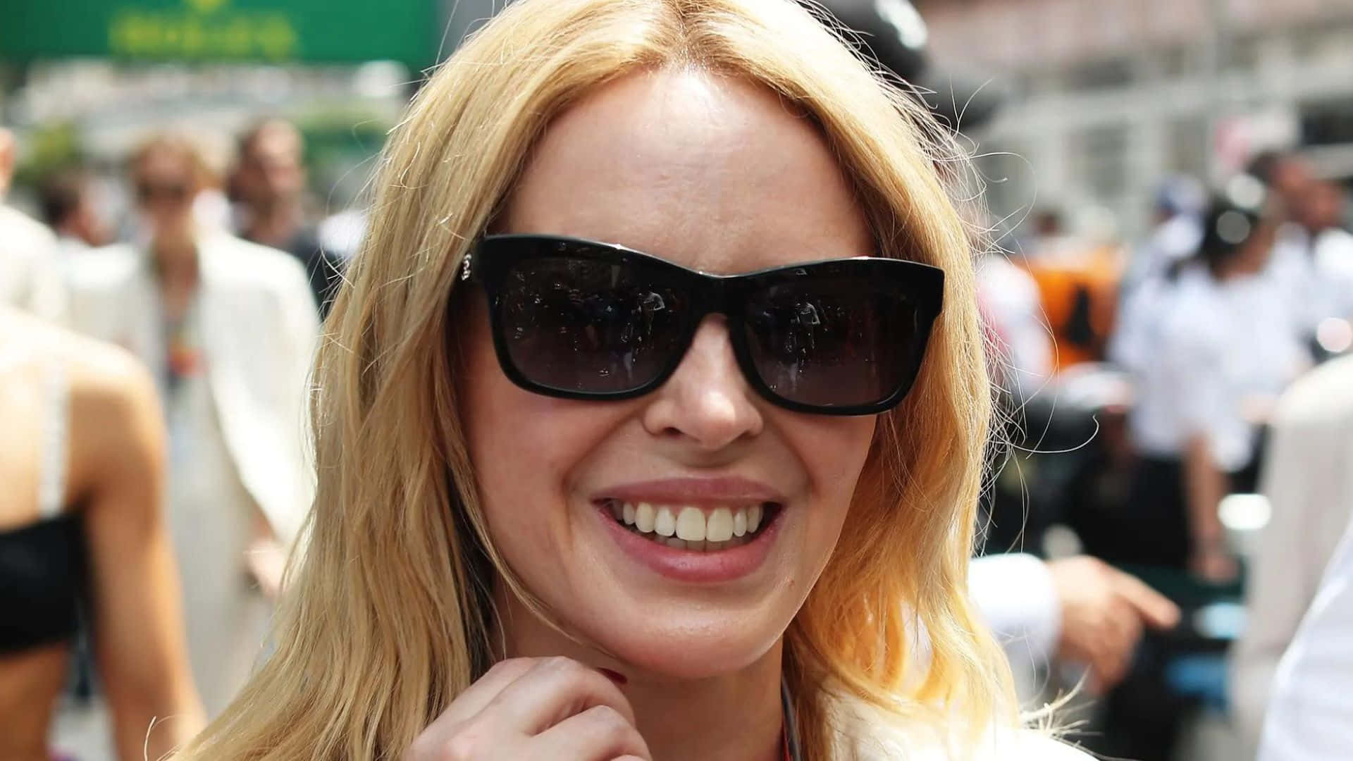 Kylie Minogue Sunglasses Smile Background