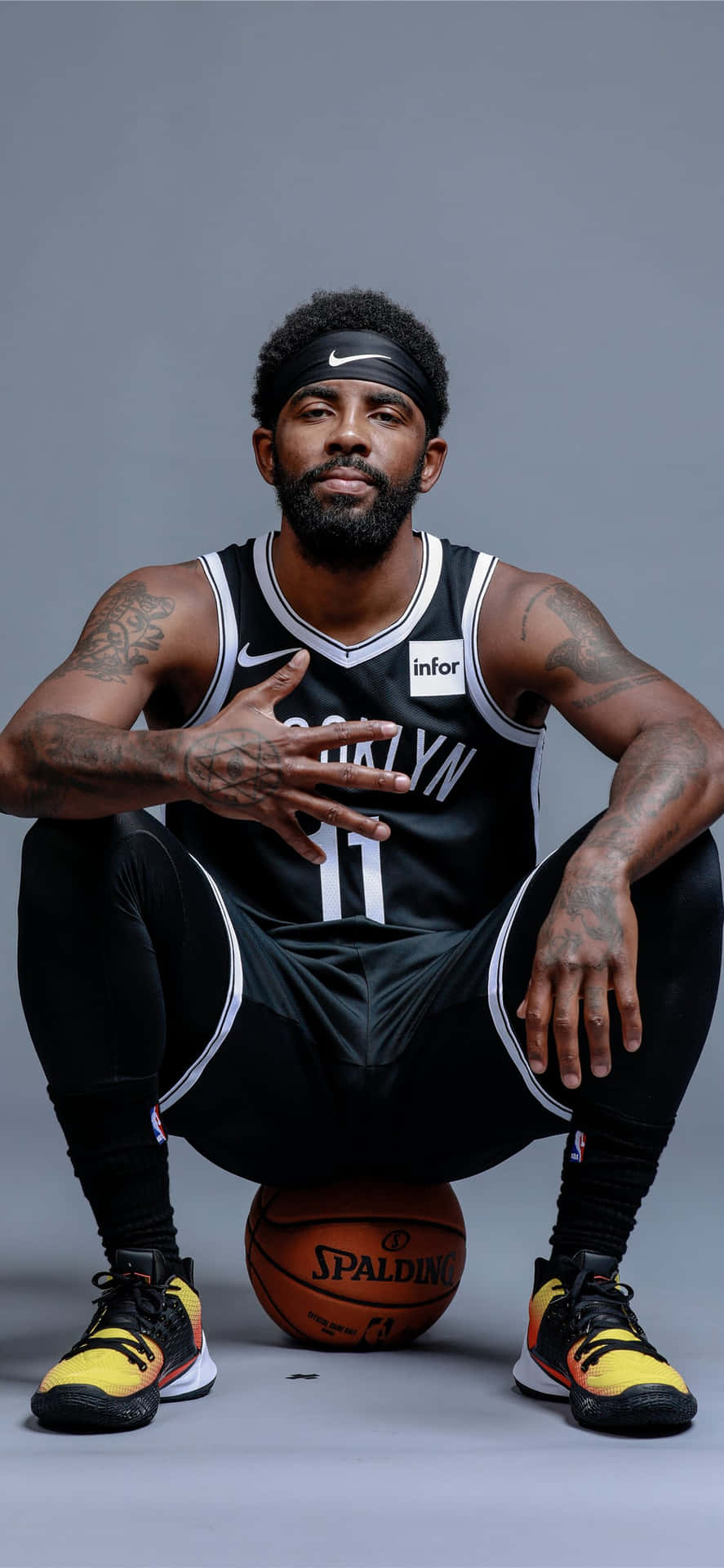 Kyrie Irving (#11) Takes The Court With The Brooklyn Nets Background