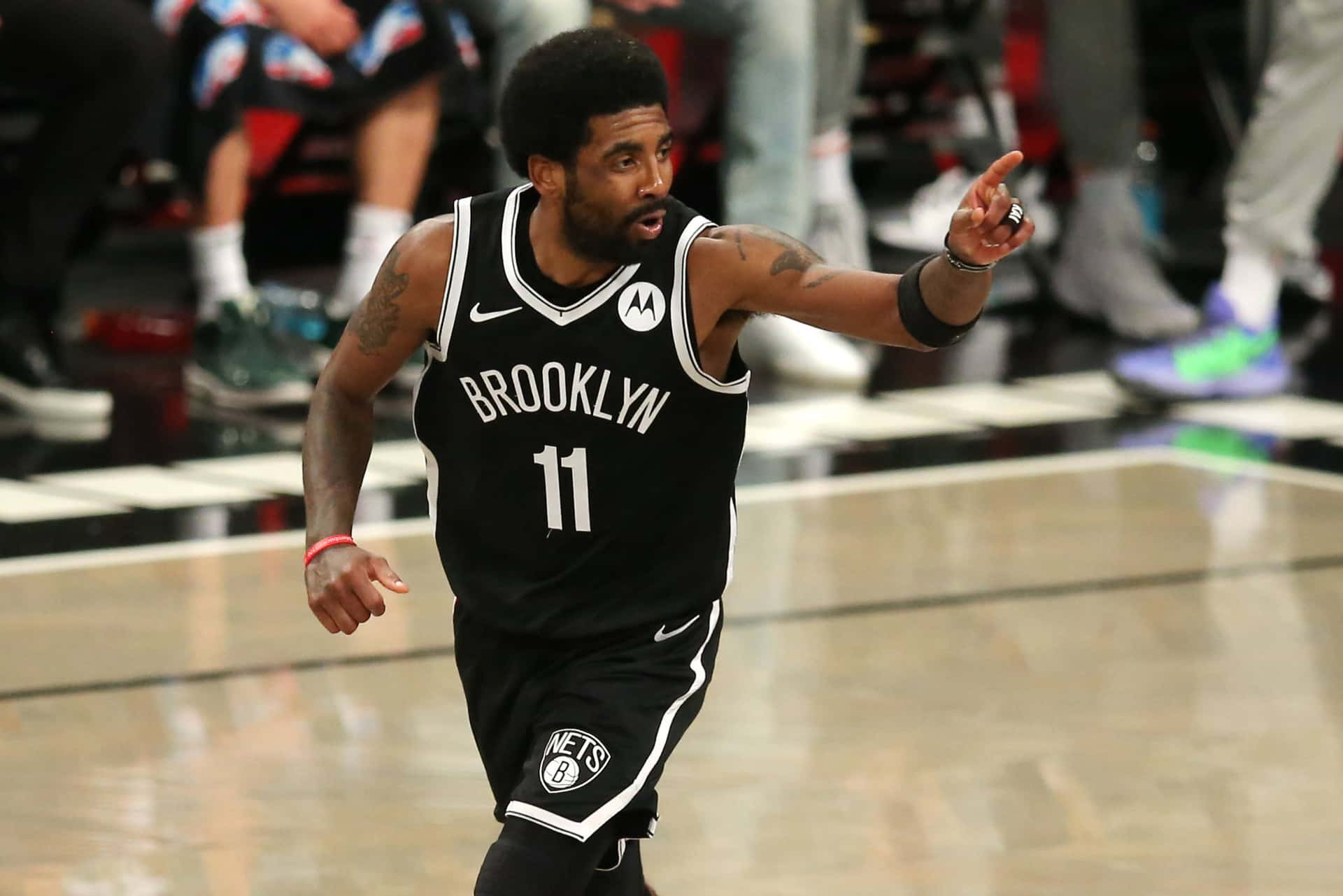 Kyrie Irving In Action For The Brooklyn Nets Background