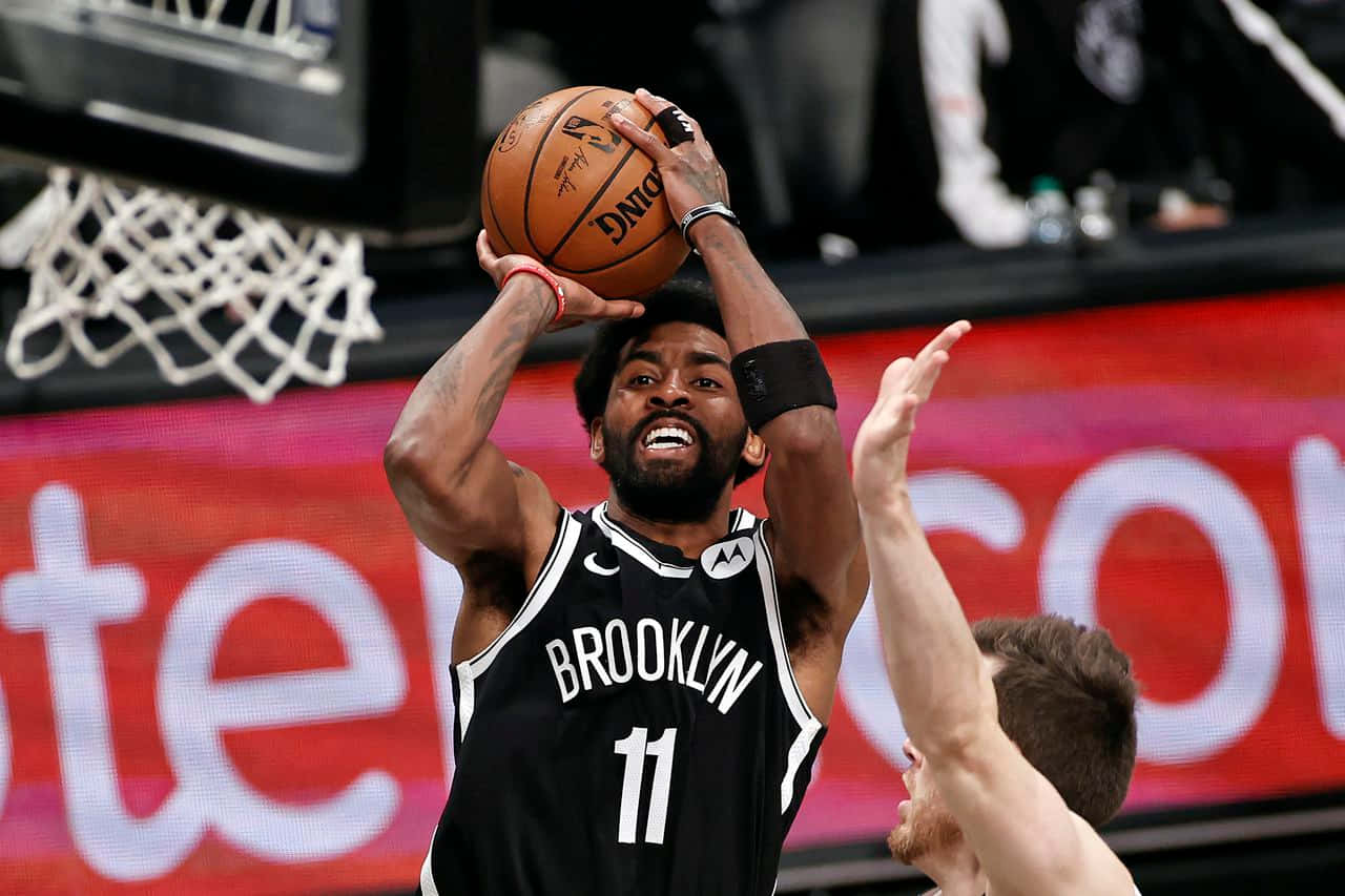 Kyrie Irving In His Debut As A Brooklyn Nets Player Background