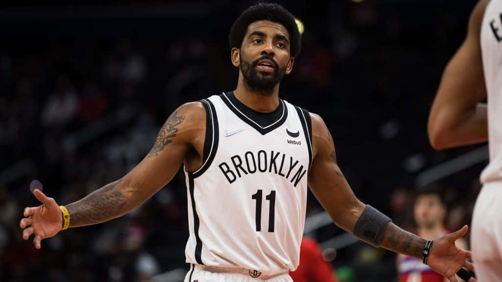 Kyrie Irving Nets Spreading Arms Background