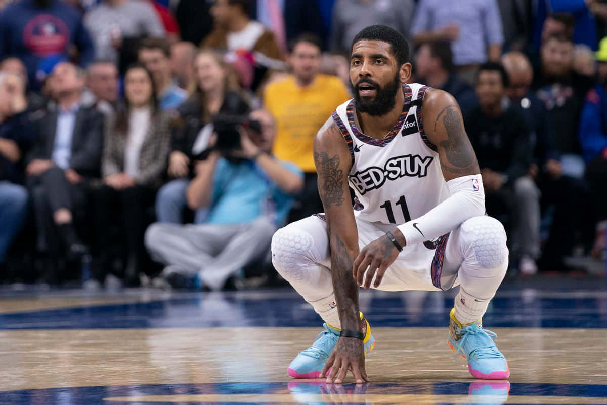 Kyrie Irving Of The Brooklyn Nets Poses For A Photoshoot Background