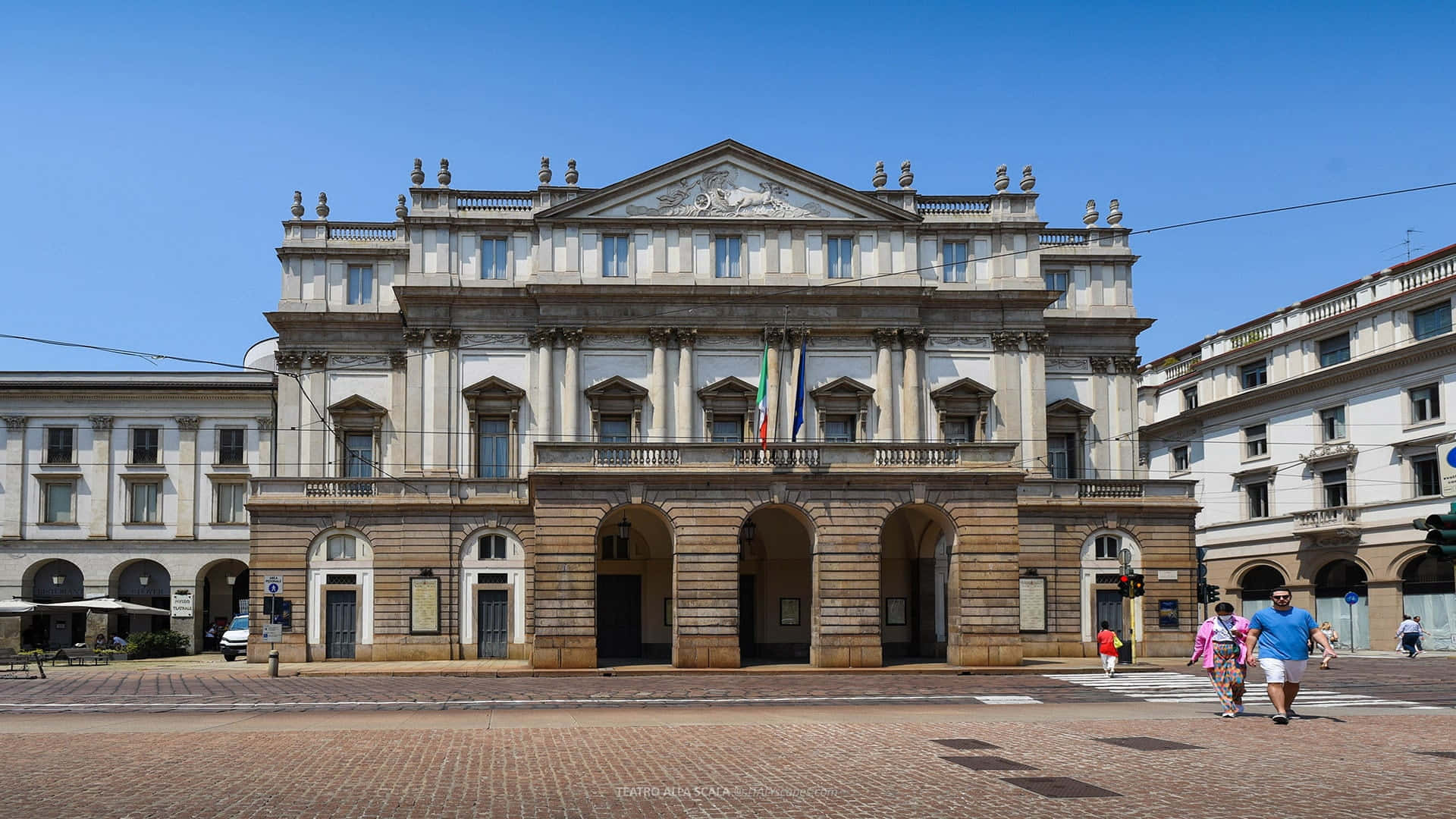 La Scala Opera House Beneath The Blue Sky Background