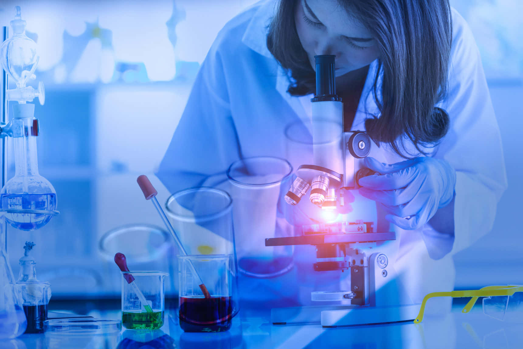 Laboratory Female Scientist Looking Microscope