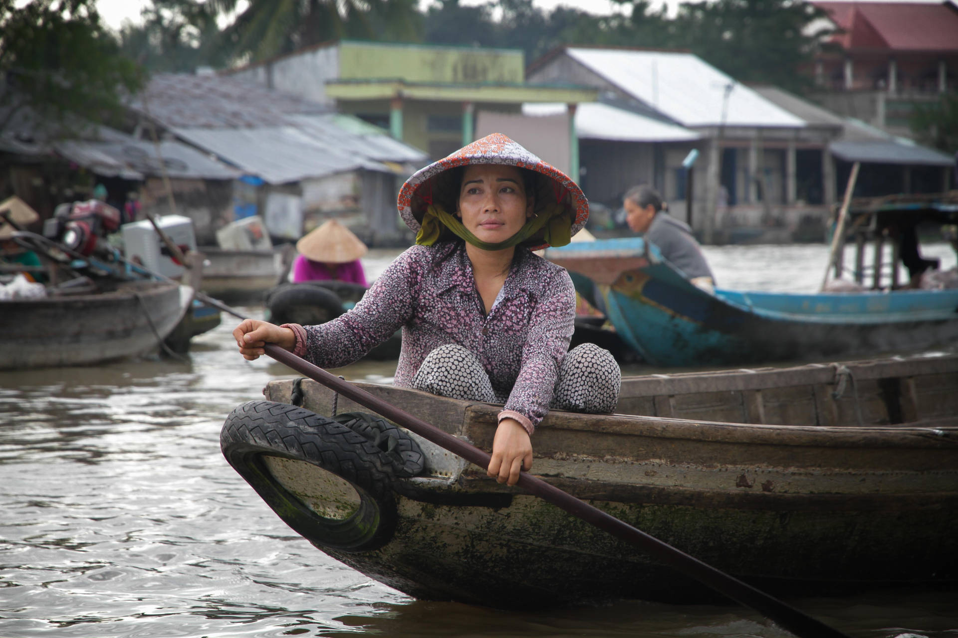Lady On An Old Wooden Boat