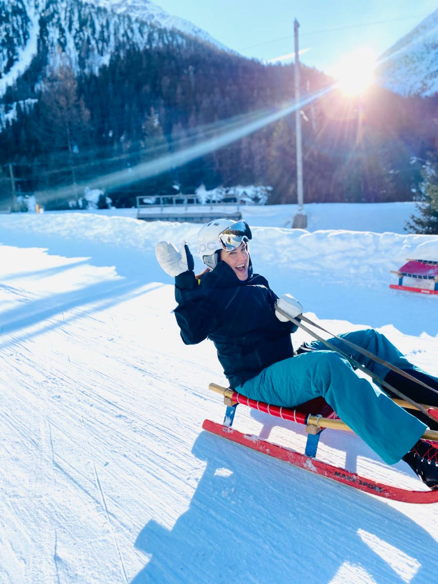 Lady Sledding Wave