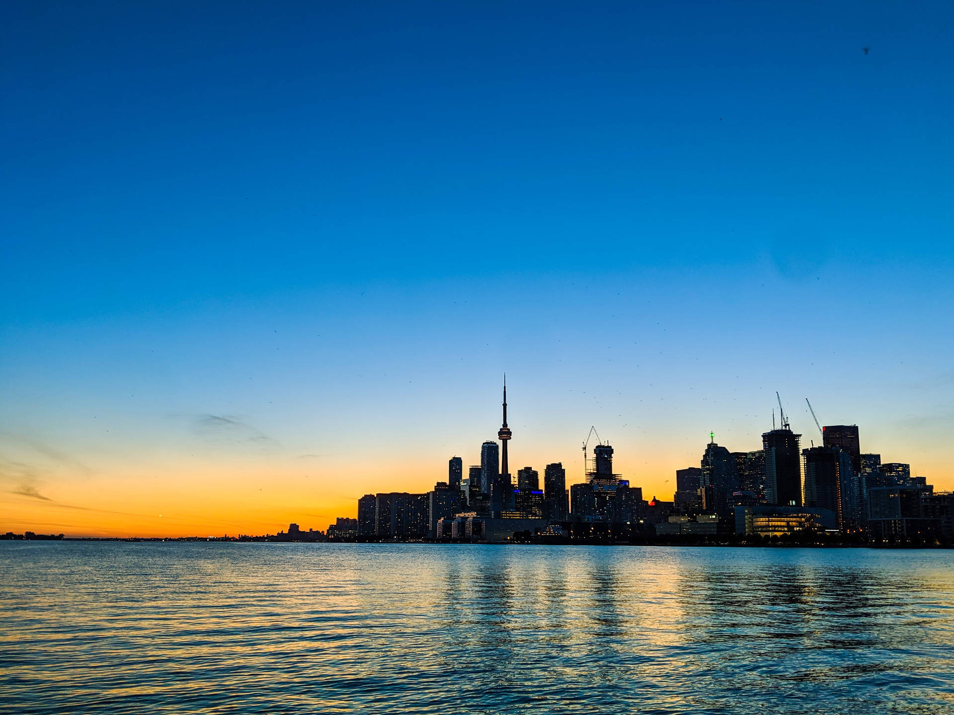 Lake Ontario Buildings And Sunrise Background