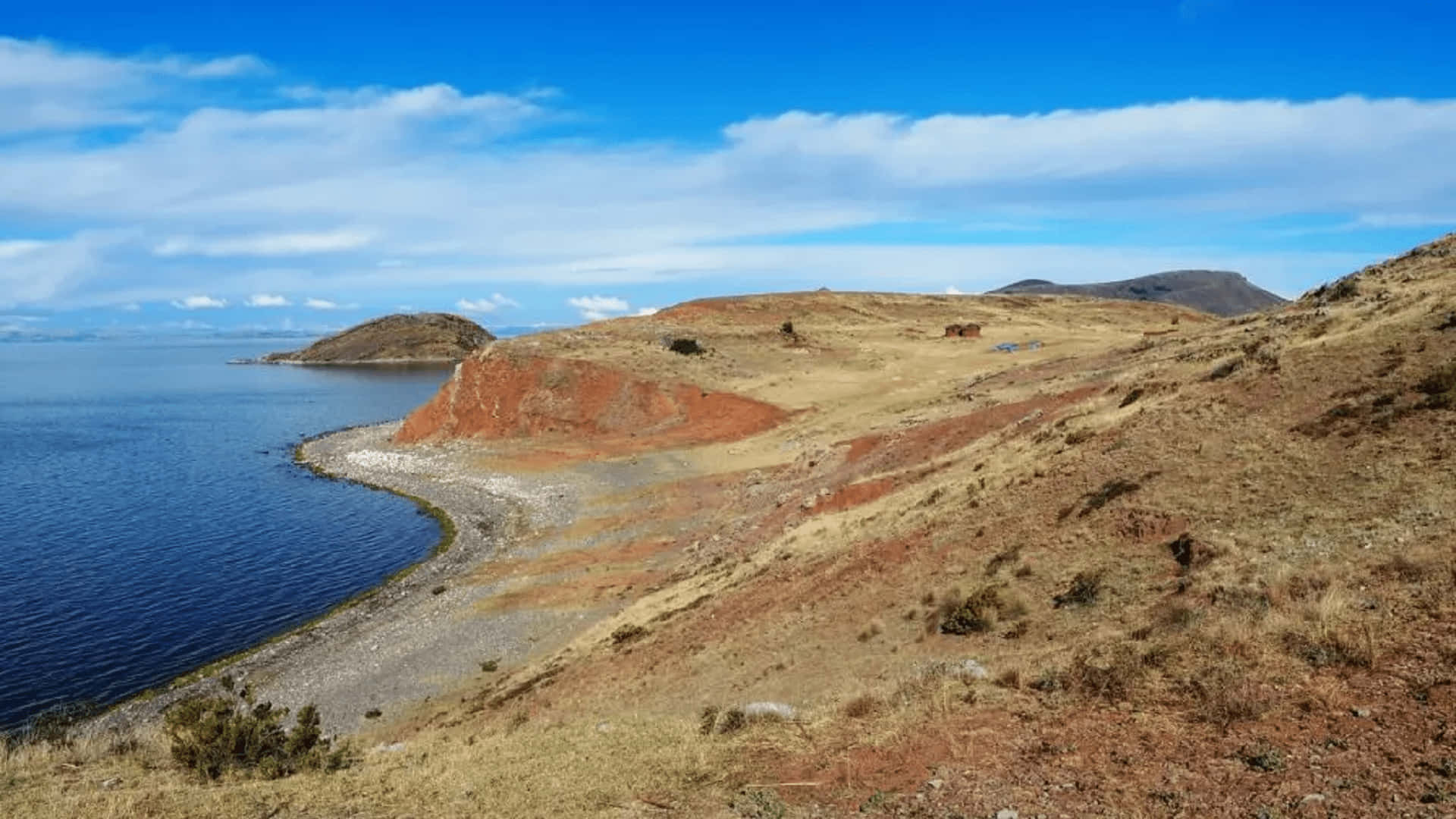 Lake Titicaca Shore In Ticonata Island Background