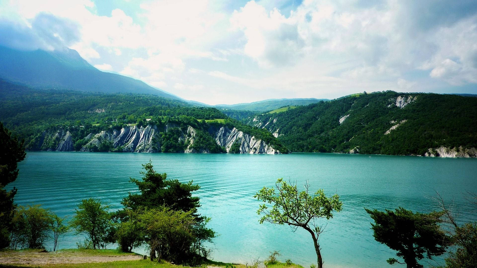 Lake View With Turquoise Water Background