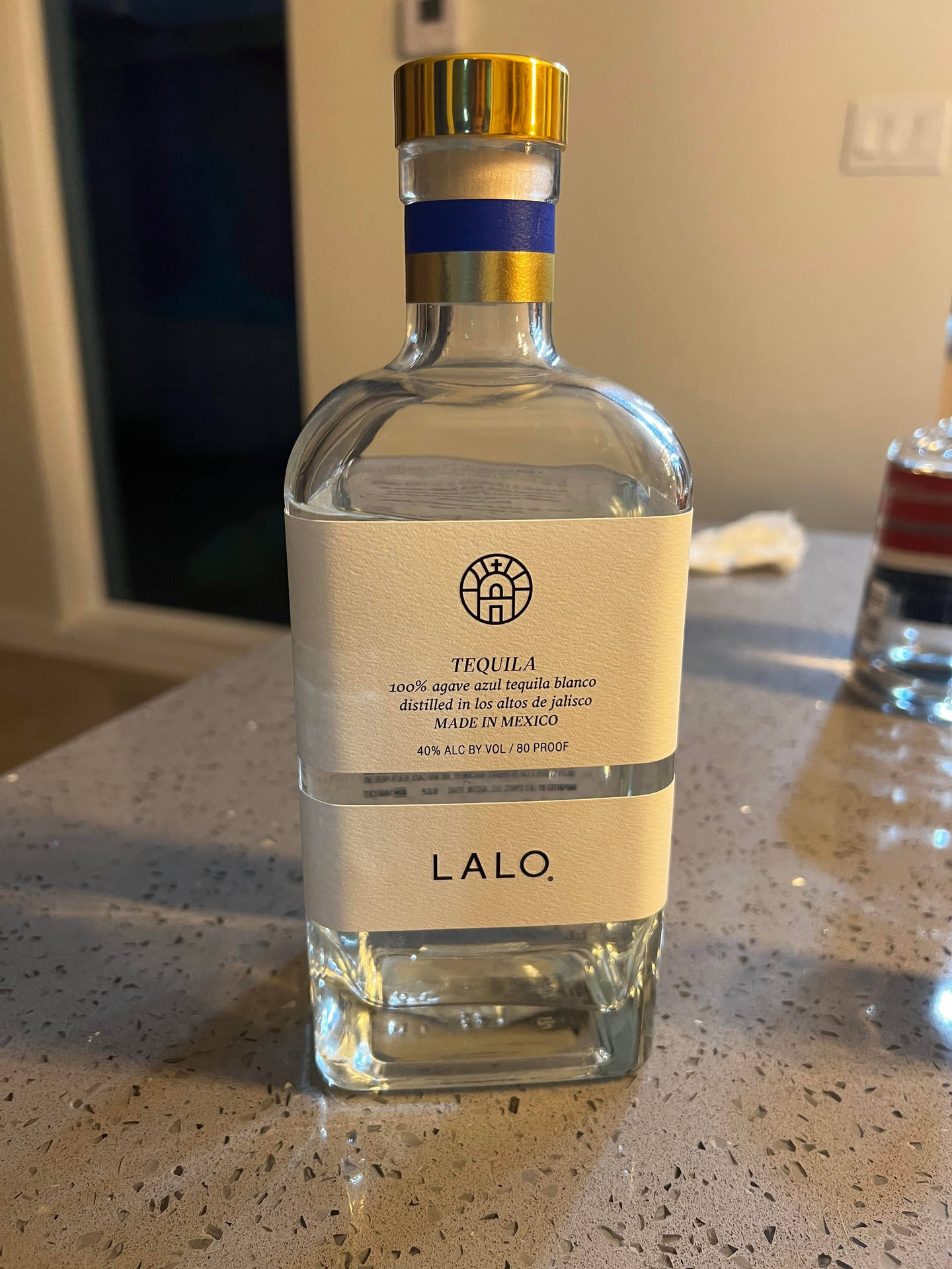 Lalo Tequila On Grey Countertop Background