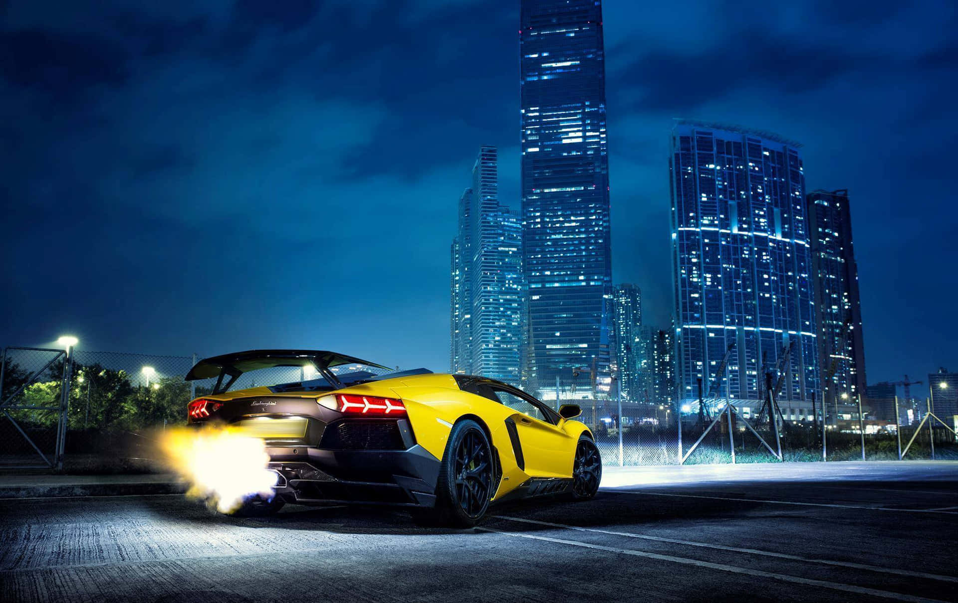 Lamborghini Aventador Exhaust Flames Night Cityscape Background