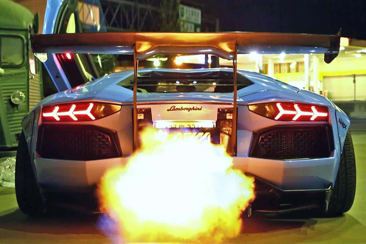Lamborghini_ Exhaust_ Fire_ Show Background