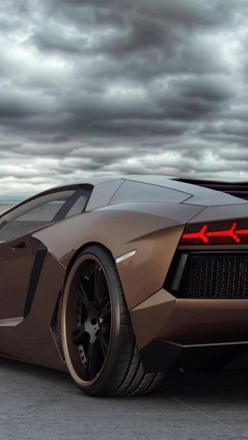 Lamborghini Iphone Brown Under Dark Clouds Background