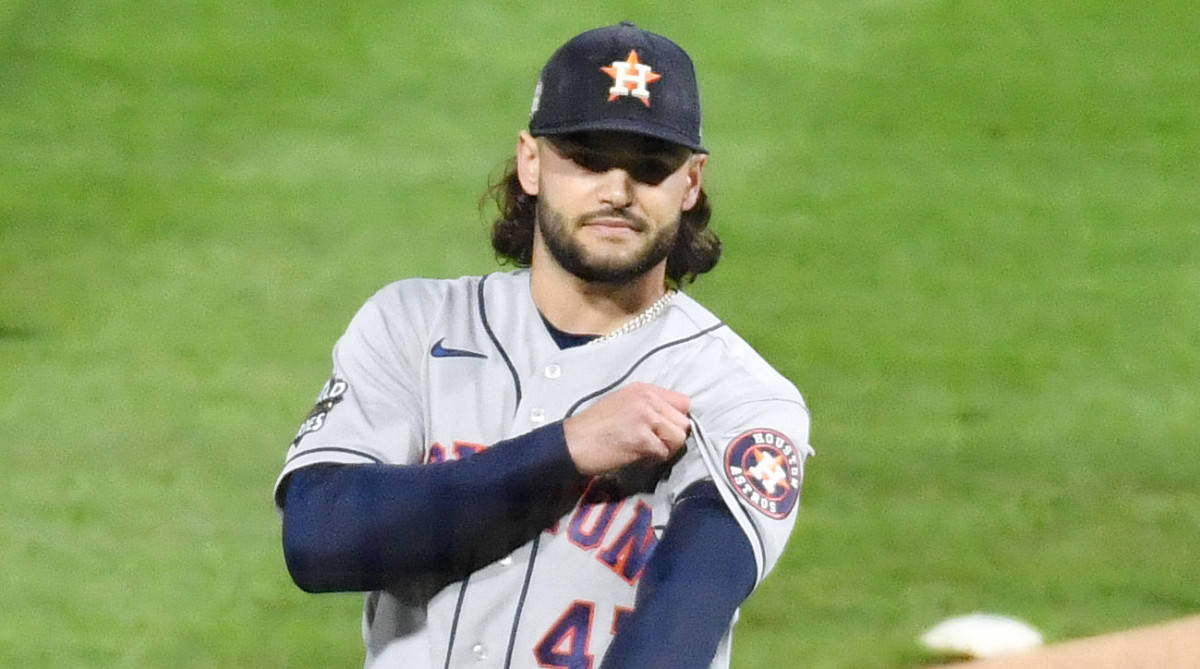 Lance Mccullers Adjusts Sleeves Background