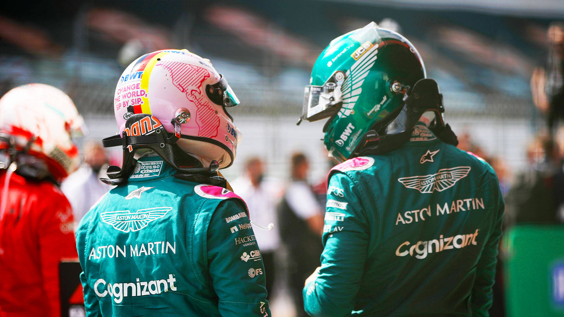 Lance Stroll And Sebastian Vettel Engaged In Conversation Background