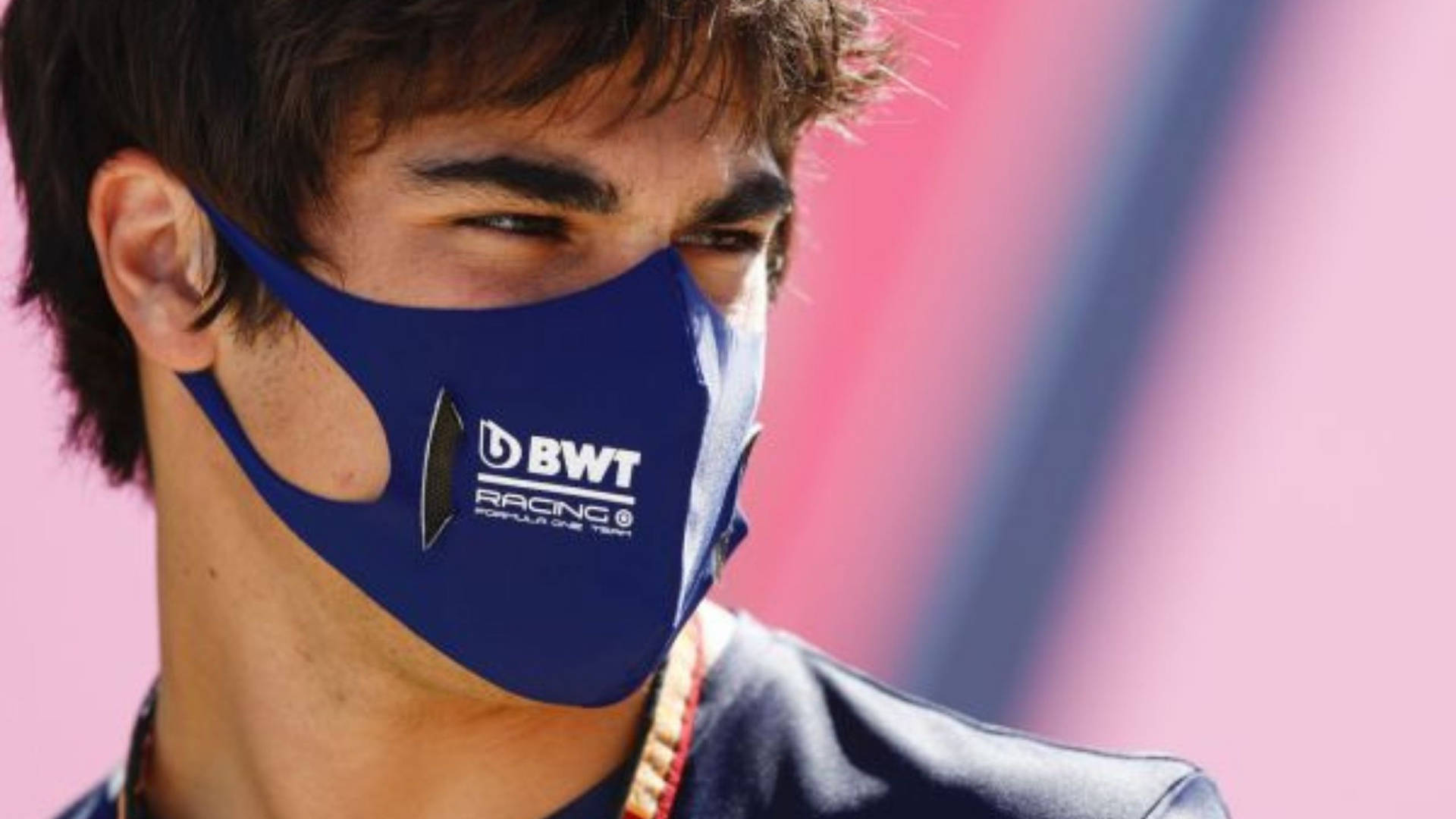 Lance Stroll Wearing Bwt Racing Mask Background