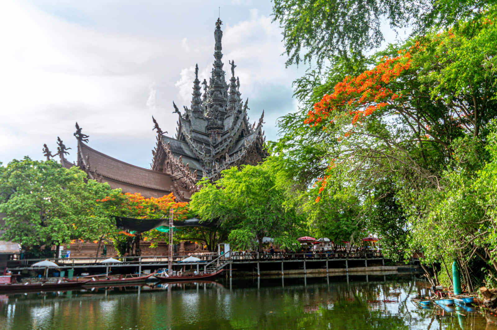 Landscape Surrounding The Sanctuary Of Truth In Thailand Background
