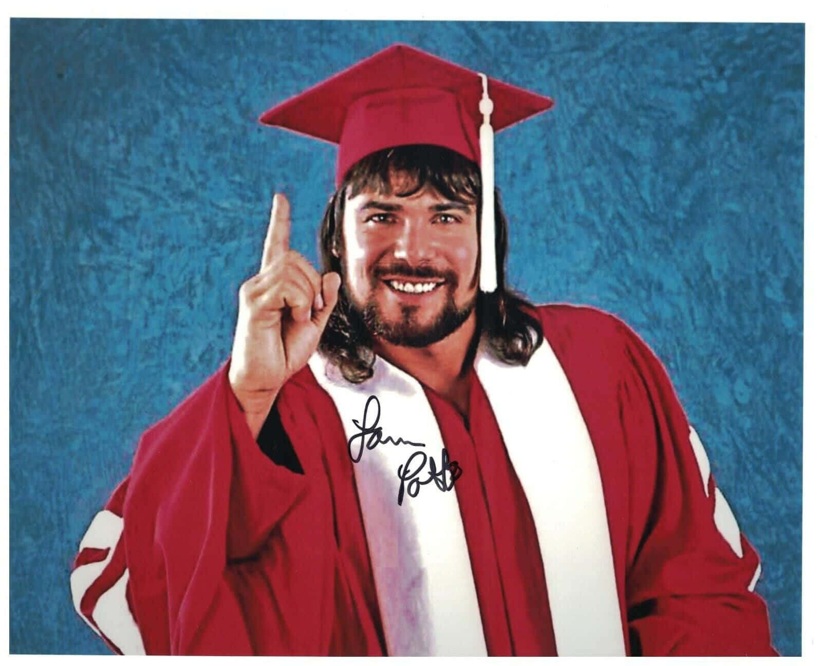 Lanny Poffo Professional Wrestler Gesturing A Point Upwards Background