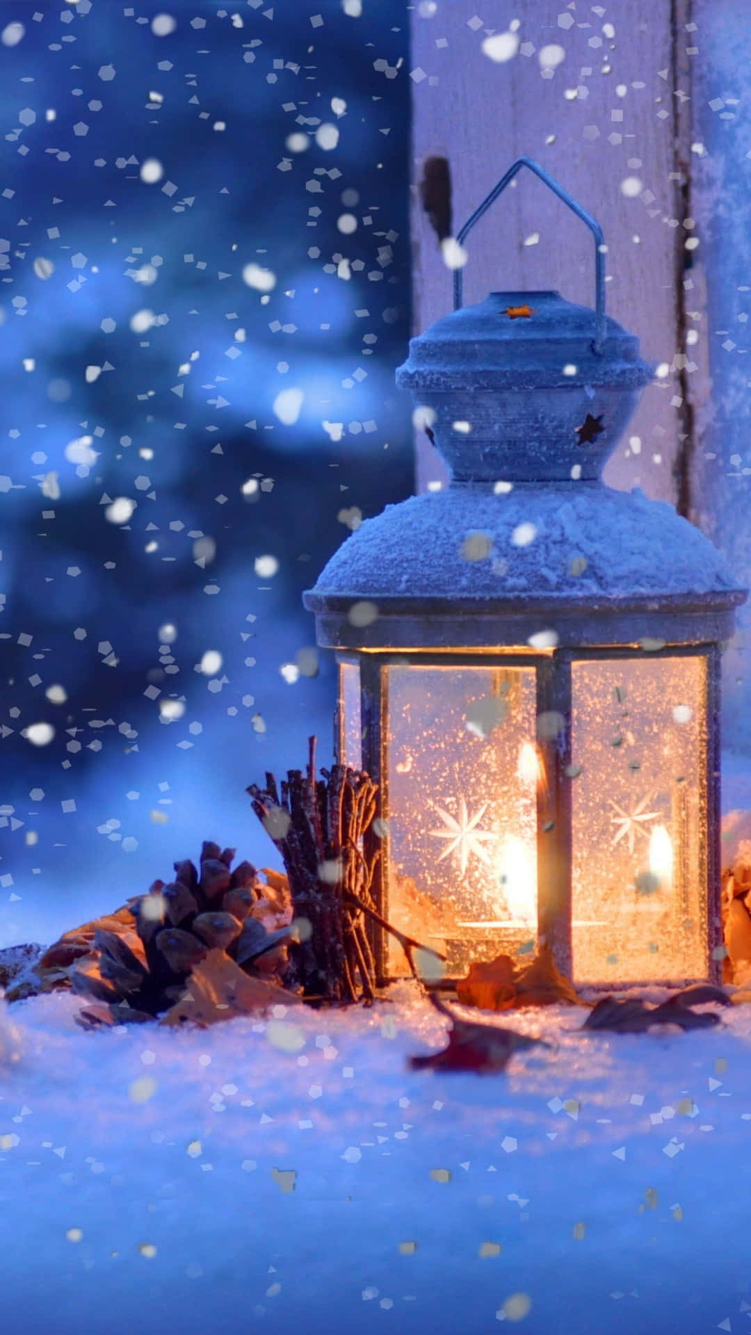 Lantern Lit With Snow Falling