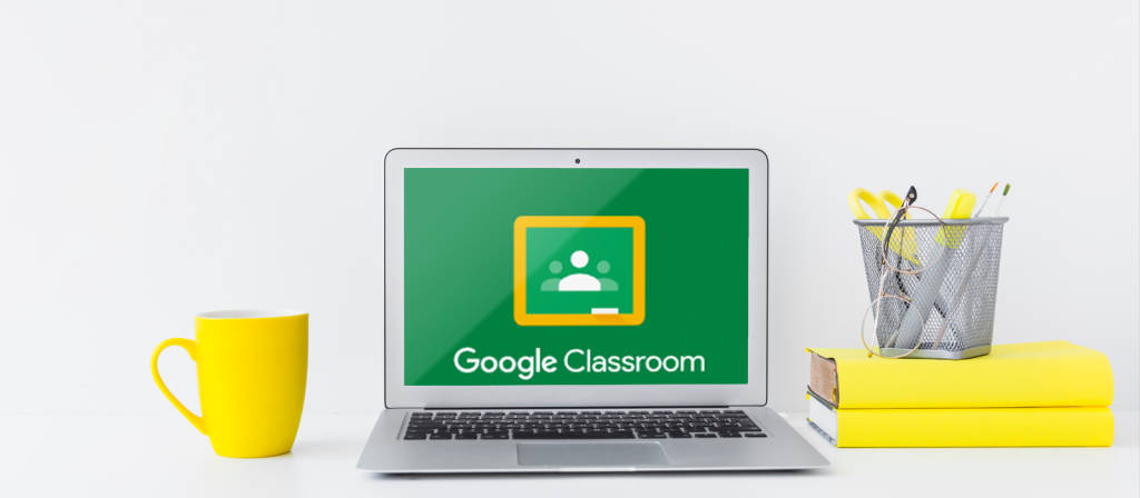 Laptop On Desk With Google Classroom Background