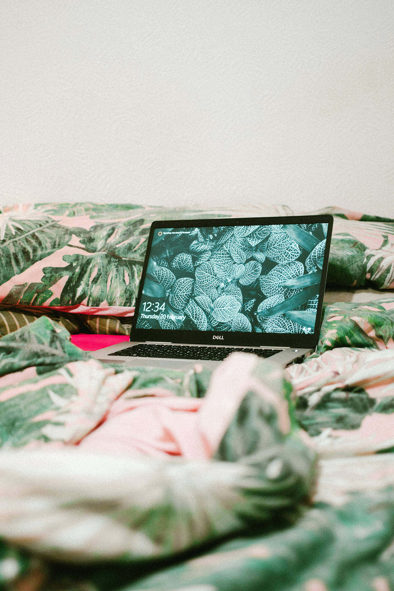 Laptop On Leaf Designed Bed Background
