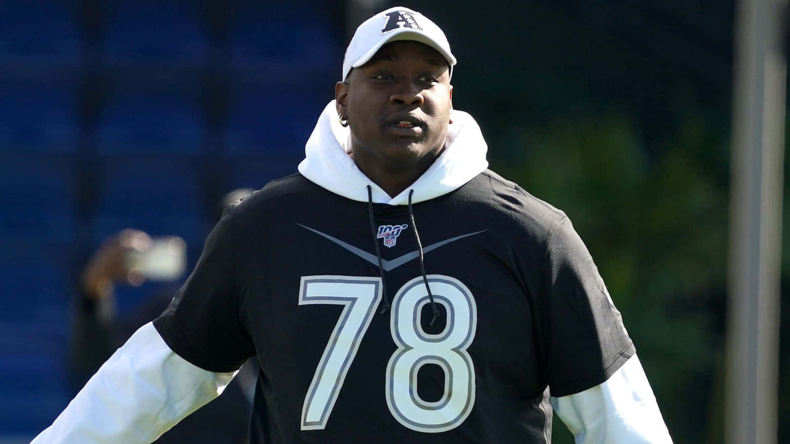 Laremy Tunsil In Casual Black Hoodie Background
