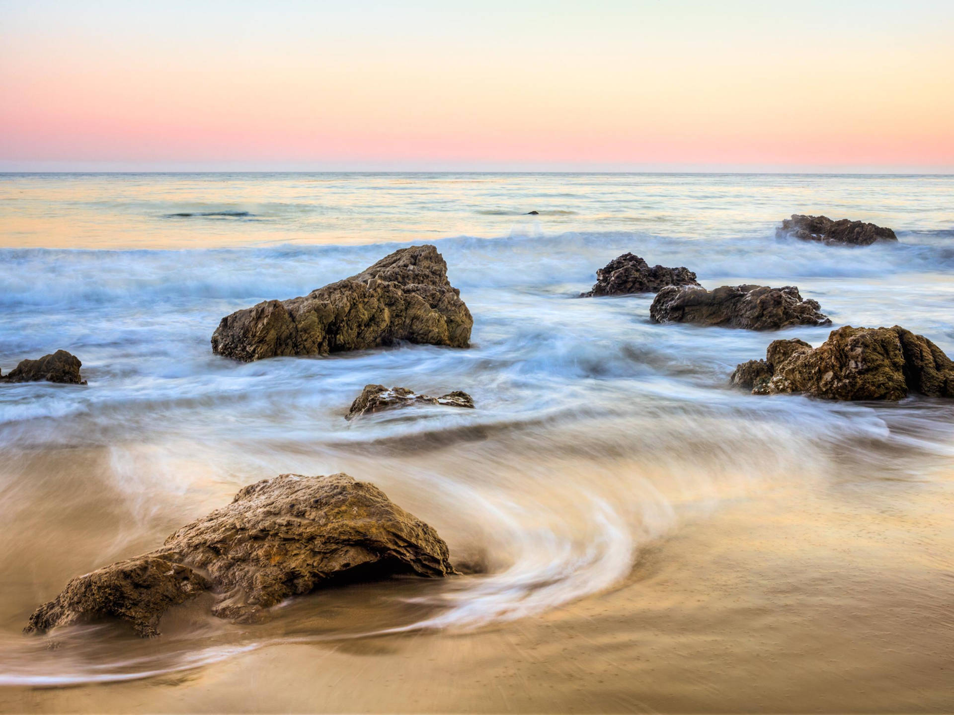 Large Boulders On Malibu Beach Background