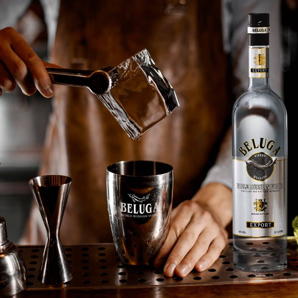 Large Ice Over A Glass Of Beluga Vodka Background