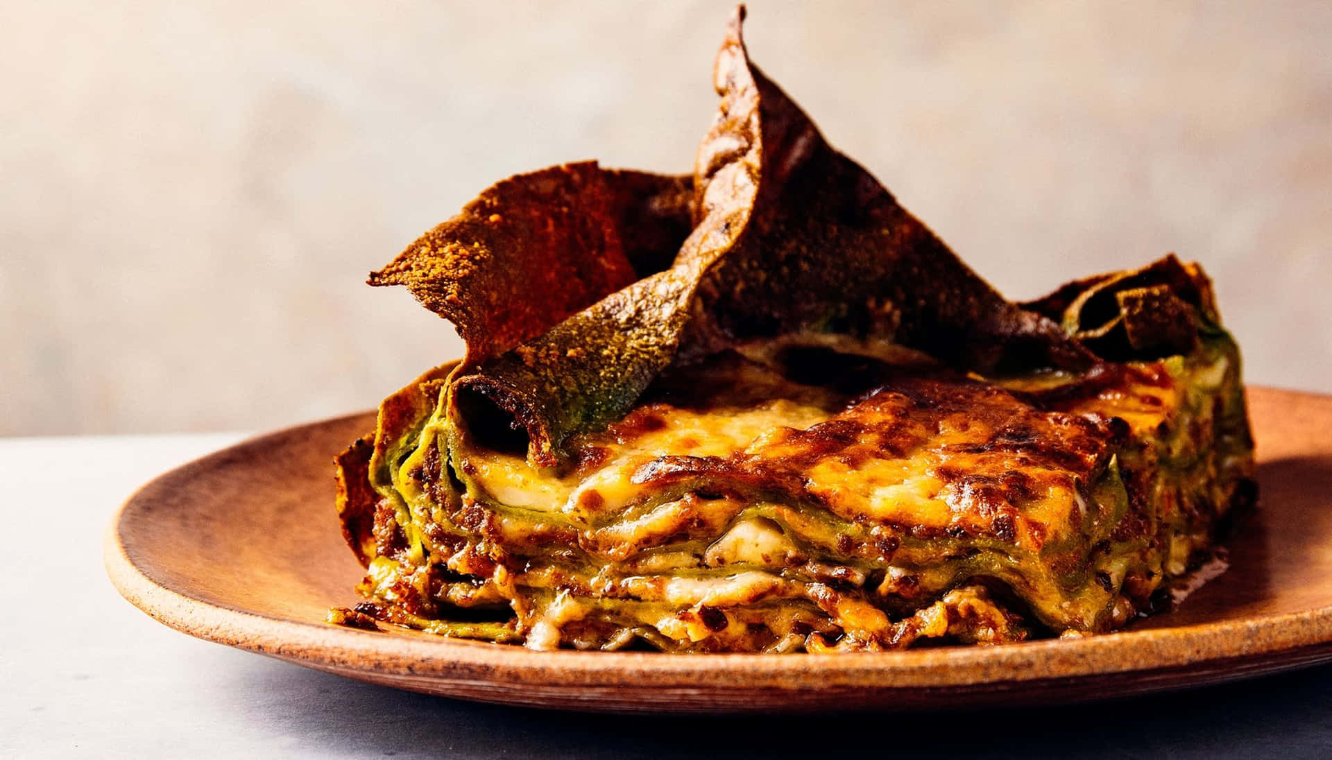 Lasagna Alla Bolognese With Burnt Edges Background