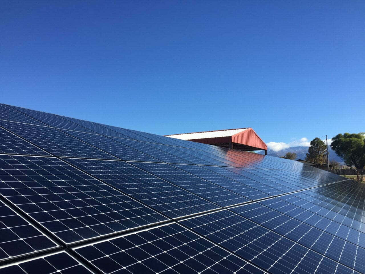 Lateral View Of Solar Panel Installation Background