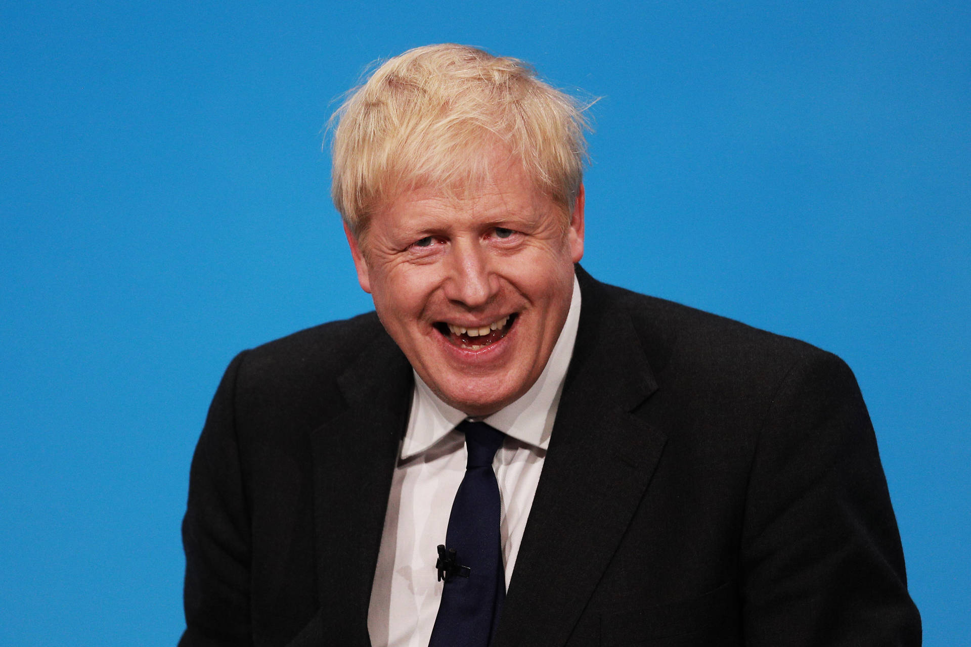 Laughing Boris Johnson On Suit Background