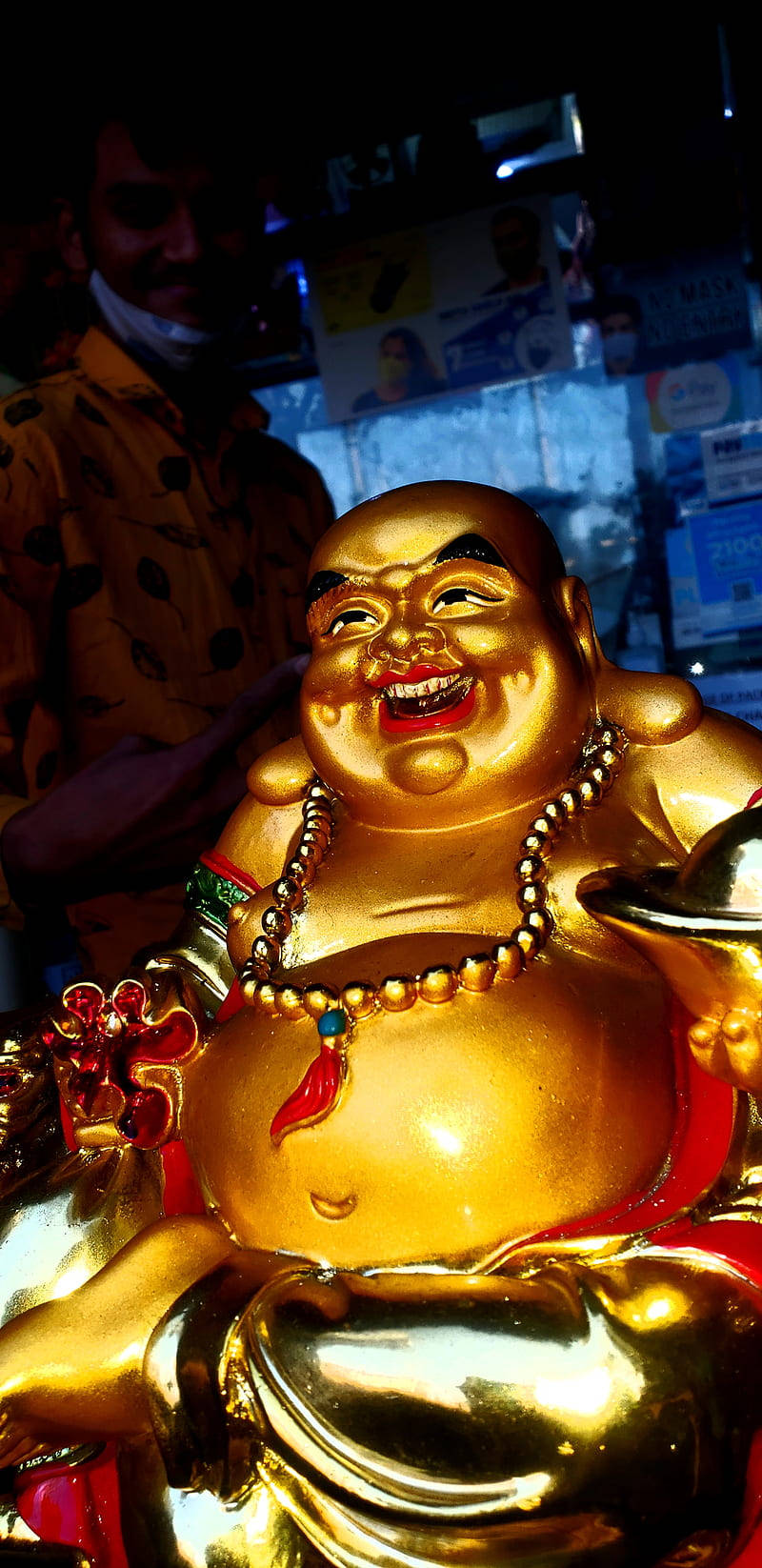 Laughing Buddha In The Store Background