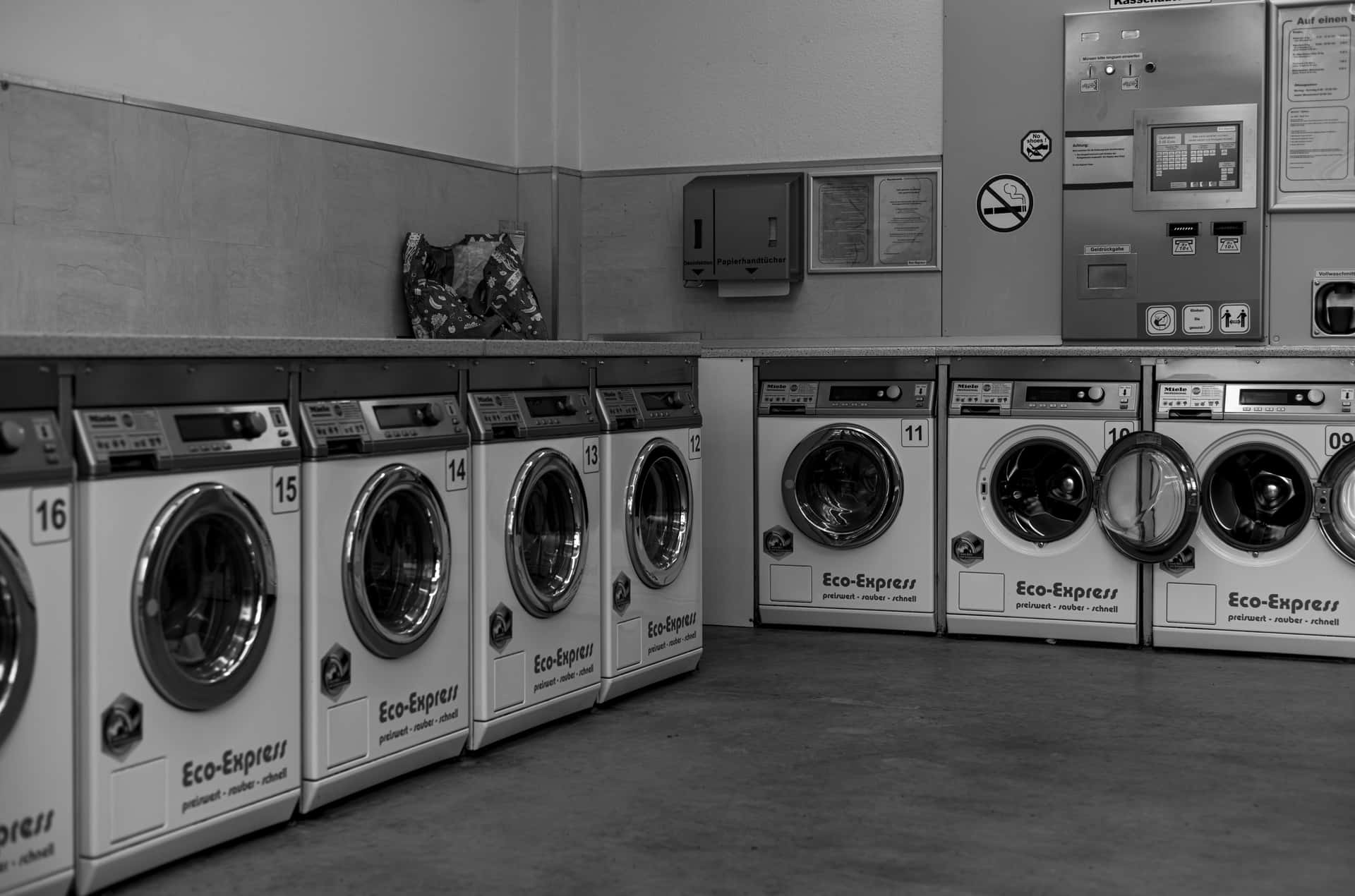 Laundromat Rowof Washing Machines Background