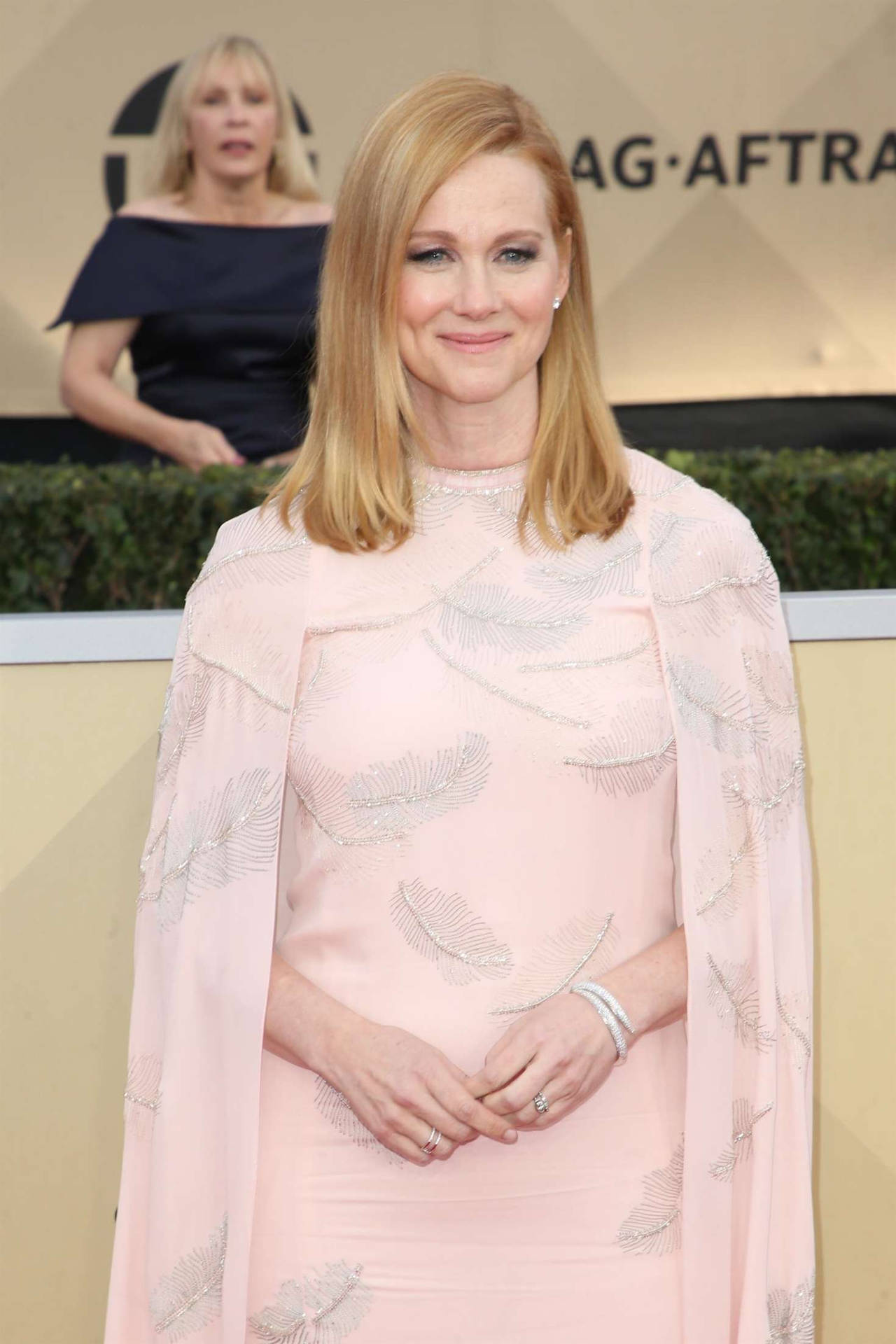 Laura Linney Pink Cape Couture Gown Background