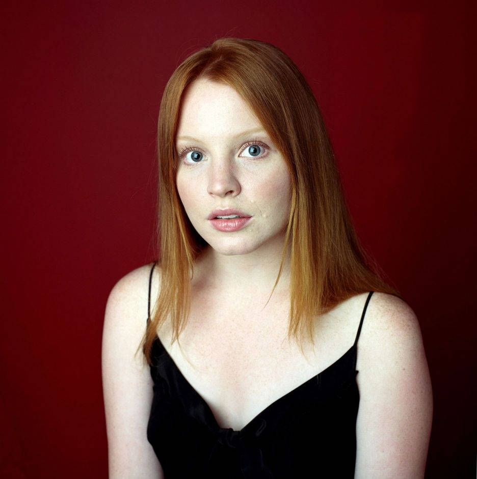 Lauren Ambrose In A Classic Black Dress Background