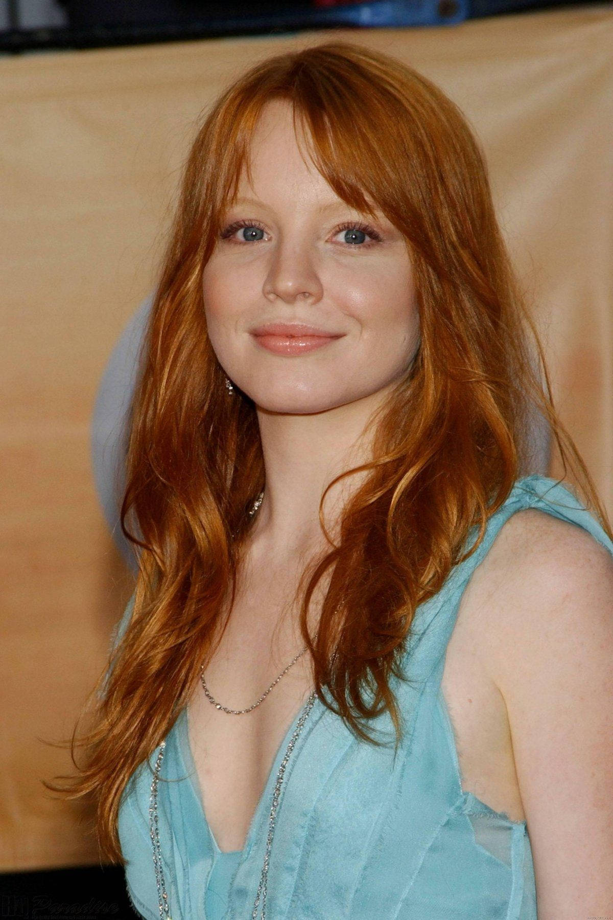 Lauren Ambrose With Curtain Bangs Background