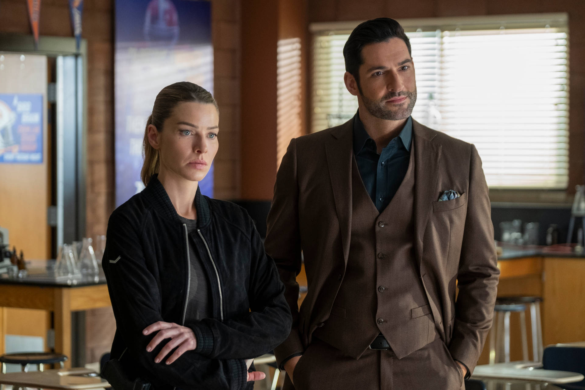 Lauren German And Tom Interrogating Someone Background