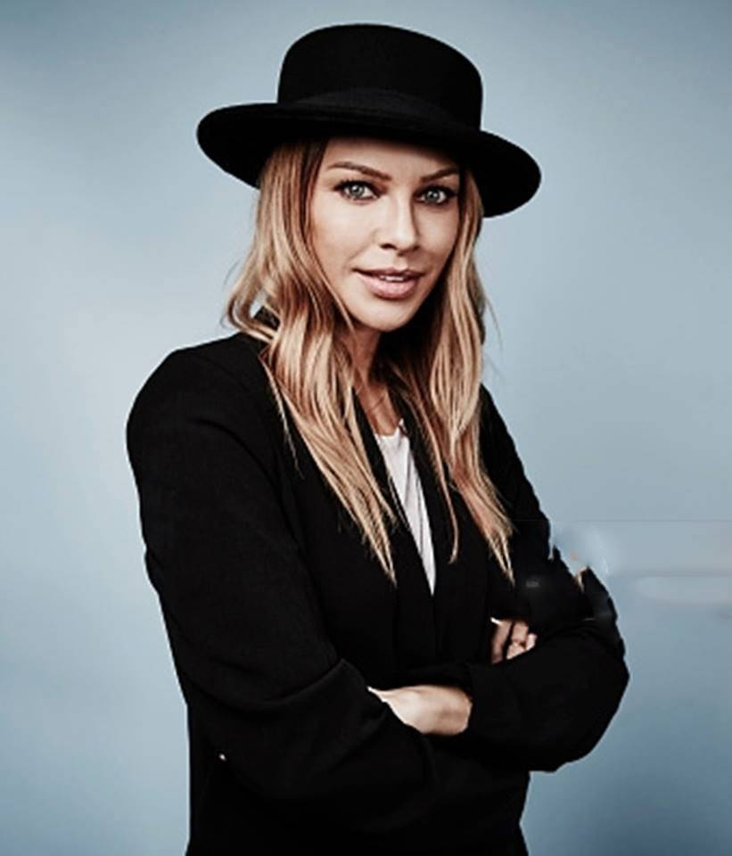 Lauren German With A Black Hat Background