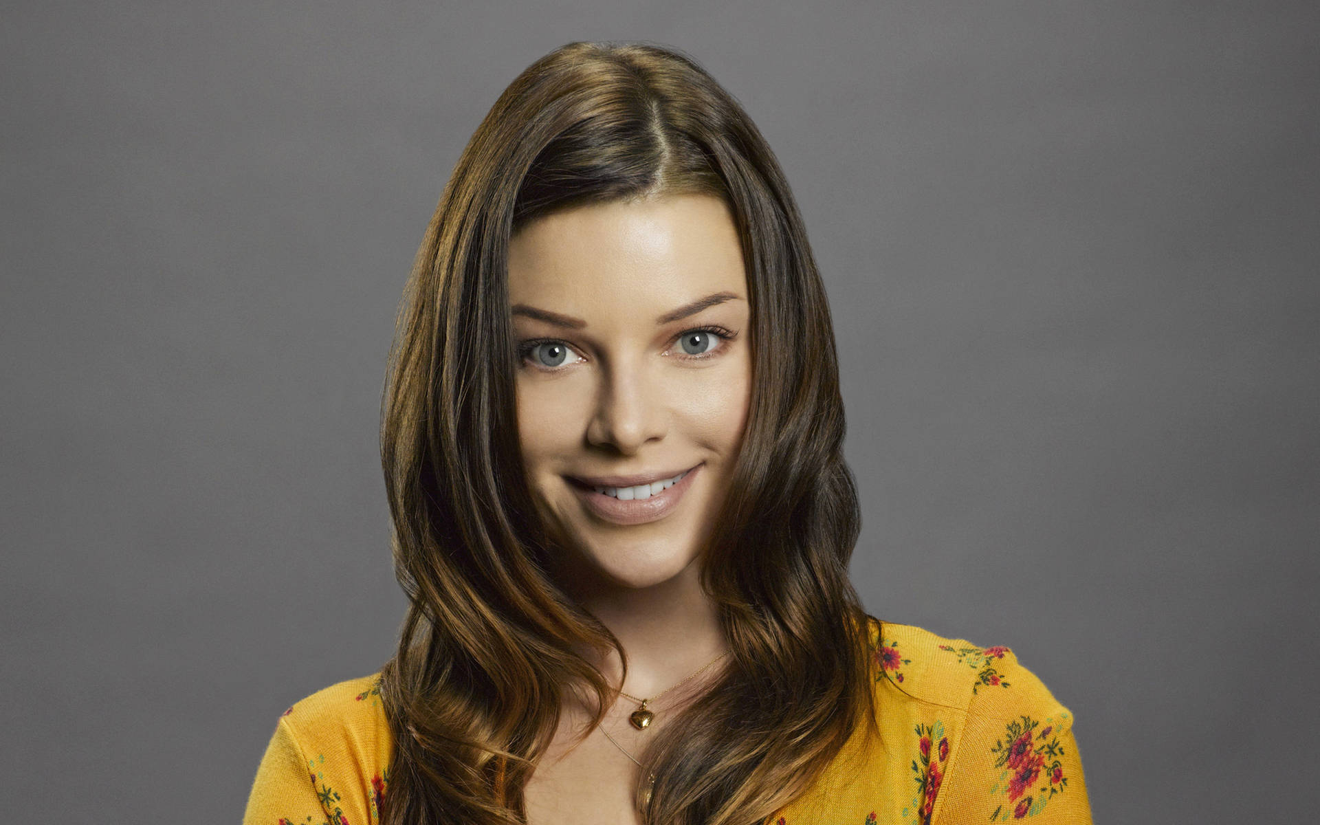 Lauren German With A Yellow Shirt Background