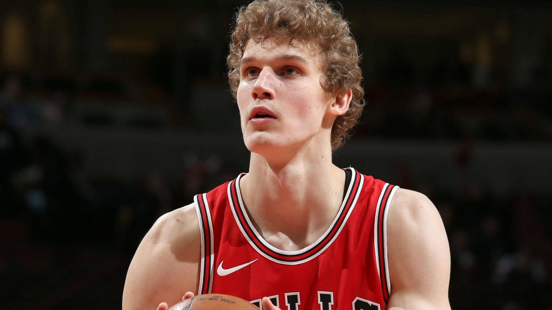 Lauri Markkanen Bulls Red Jersey Background