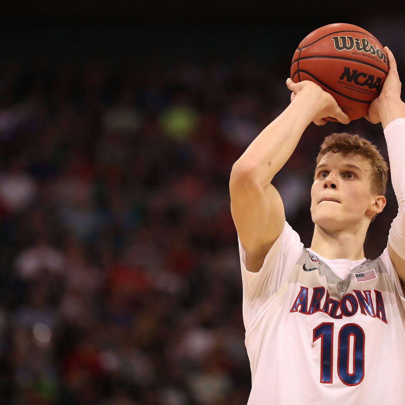 Lauri Markkanen In Action During A Basketball Game