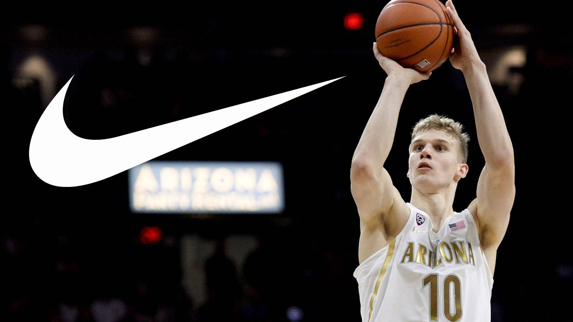 Lauri Markkanen Nike Arizona Logo Background