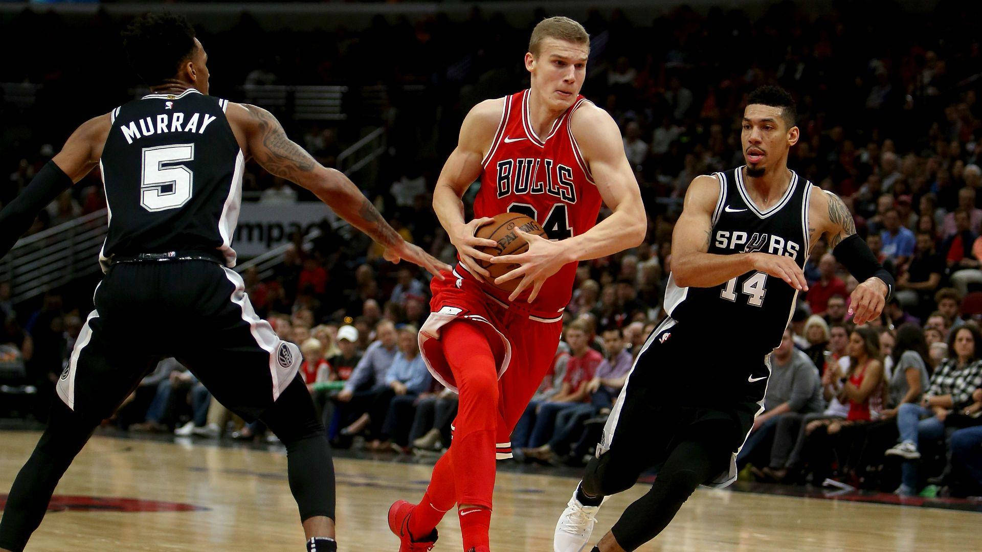 Lauri Markkanen With Murray And Mitchell Nba Finals Background