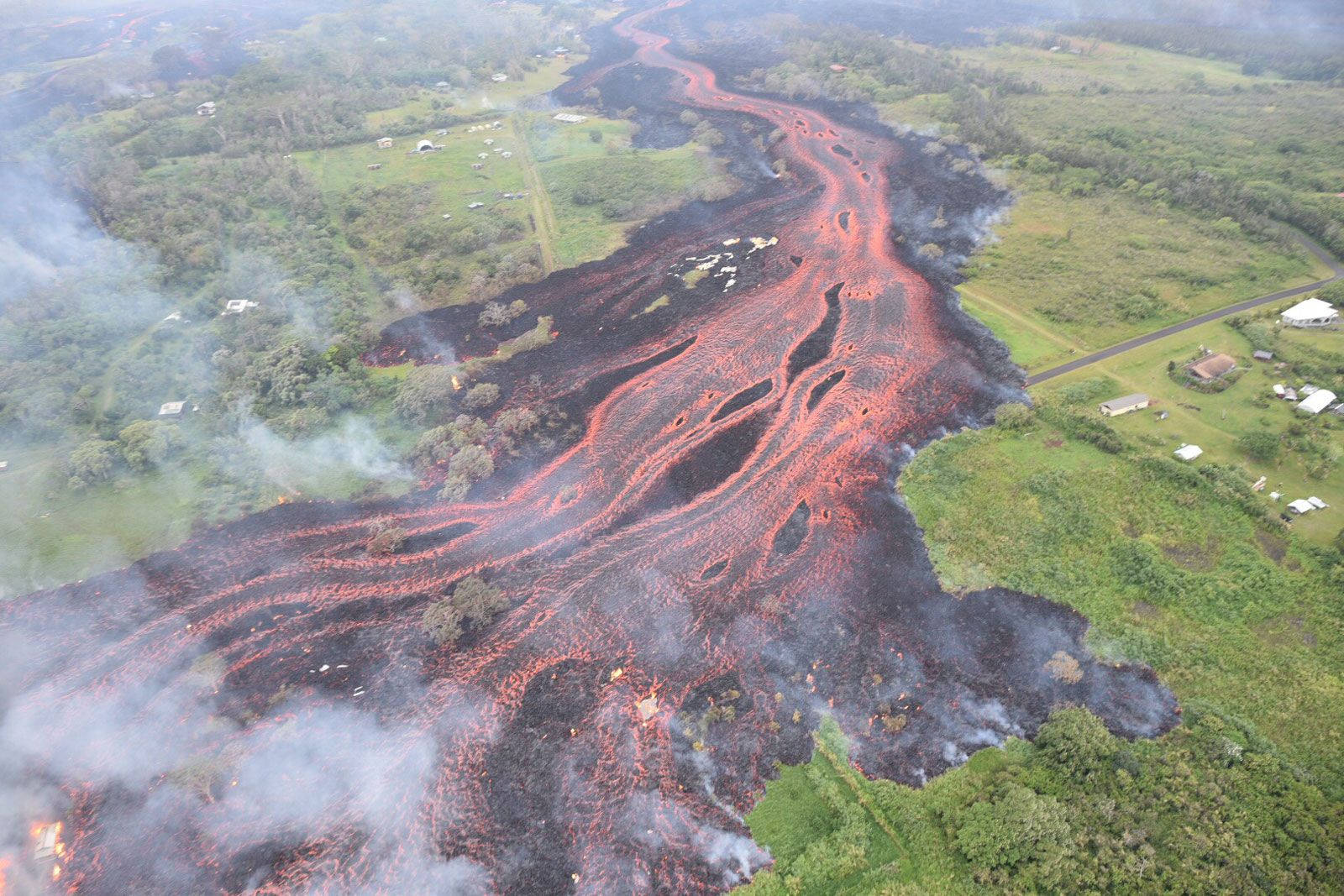 Lava Flowing Over Landscape Kilauea Volcano