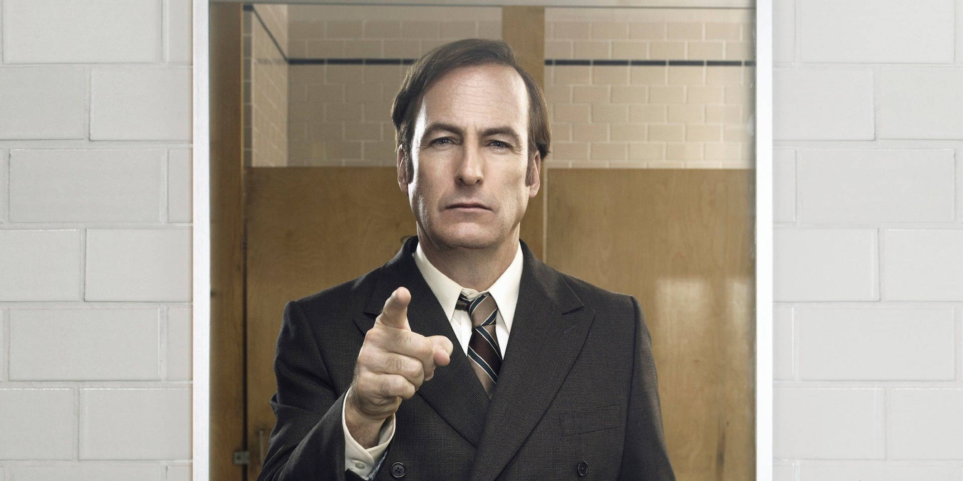Lawyer Jimmy Mcgill Peering In The Mirror In Better Call Saul