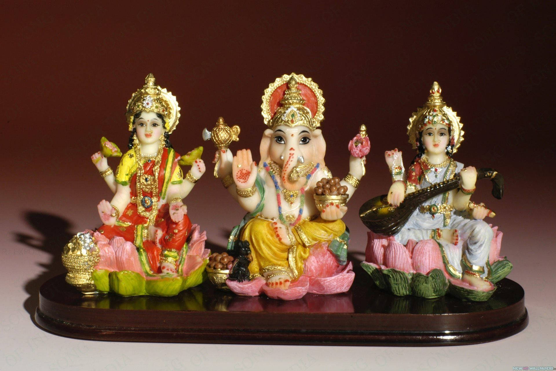 Laxmi Ganesh Saraswat Cute Figurines Background