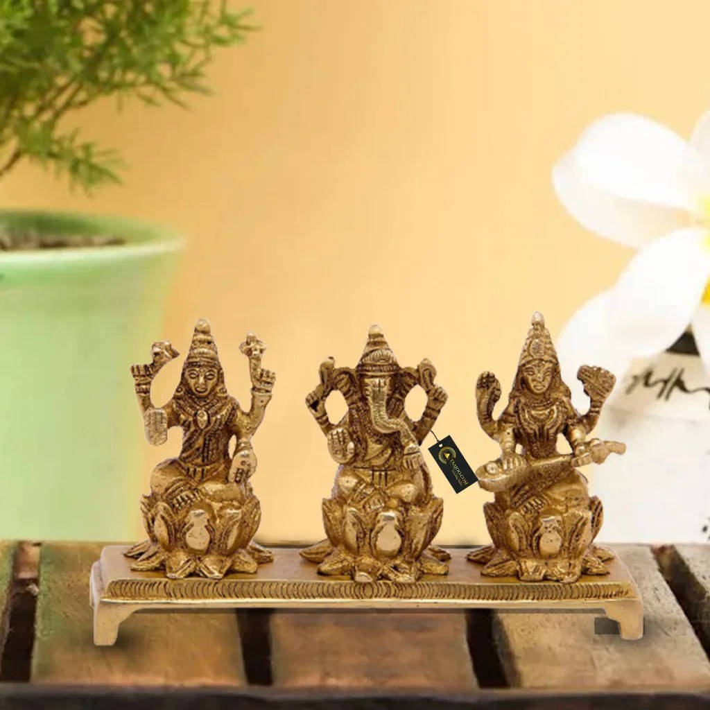 Laxmi Ganesh Saraswati Golden Figurine Background