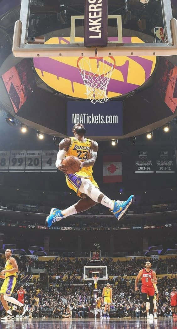 Le Bron_ James_ Soaring_ Dunk_ Lakers Background